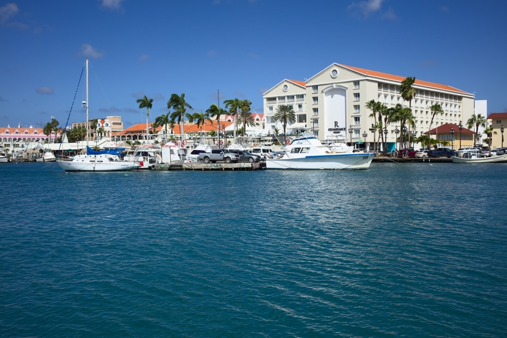 marina with renaissance resort in the background in aruba