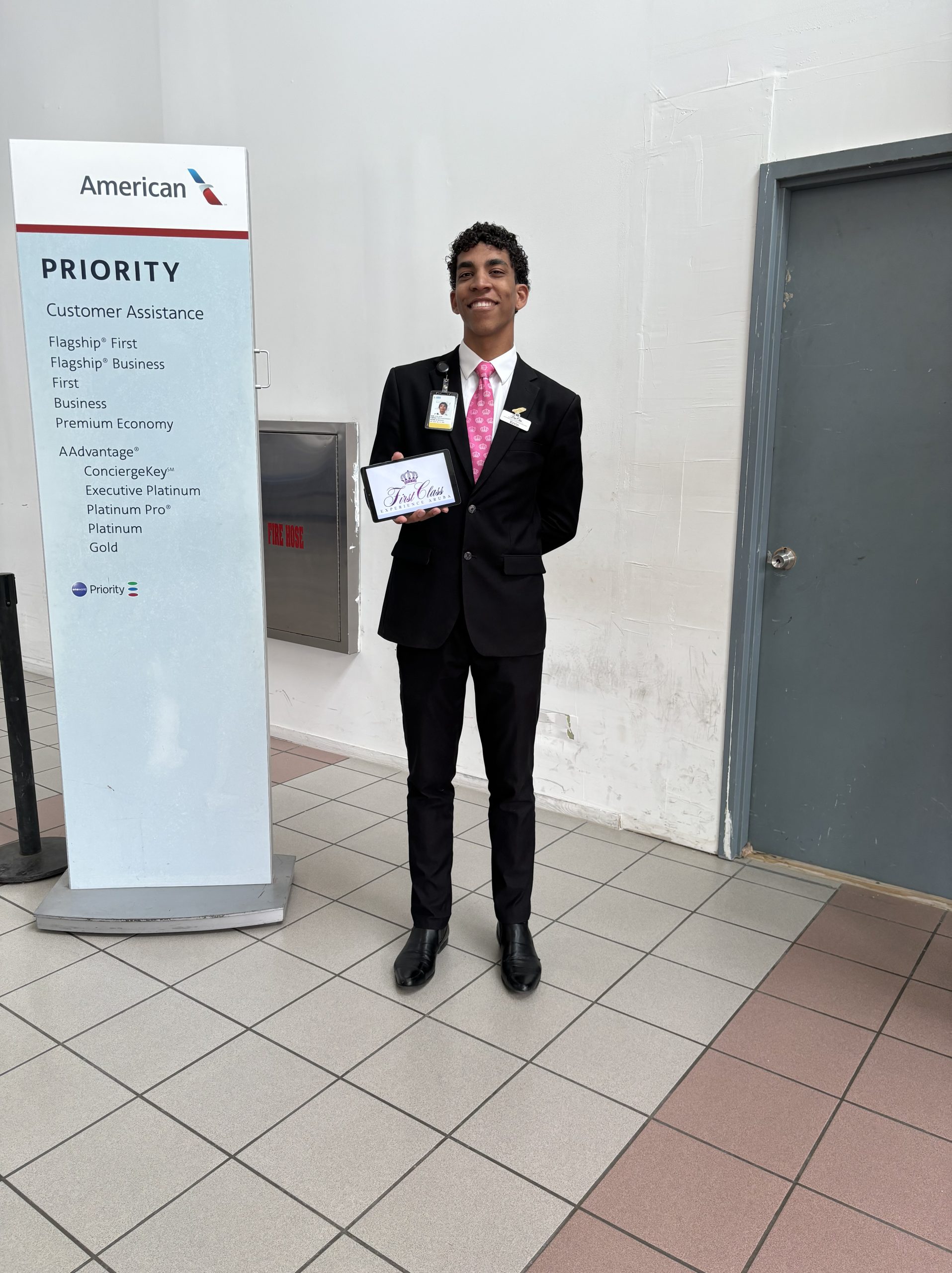 host of first class waiting for guests arrival to provide luxury airport service 4