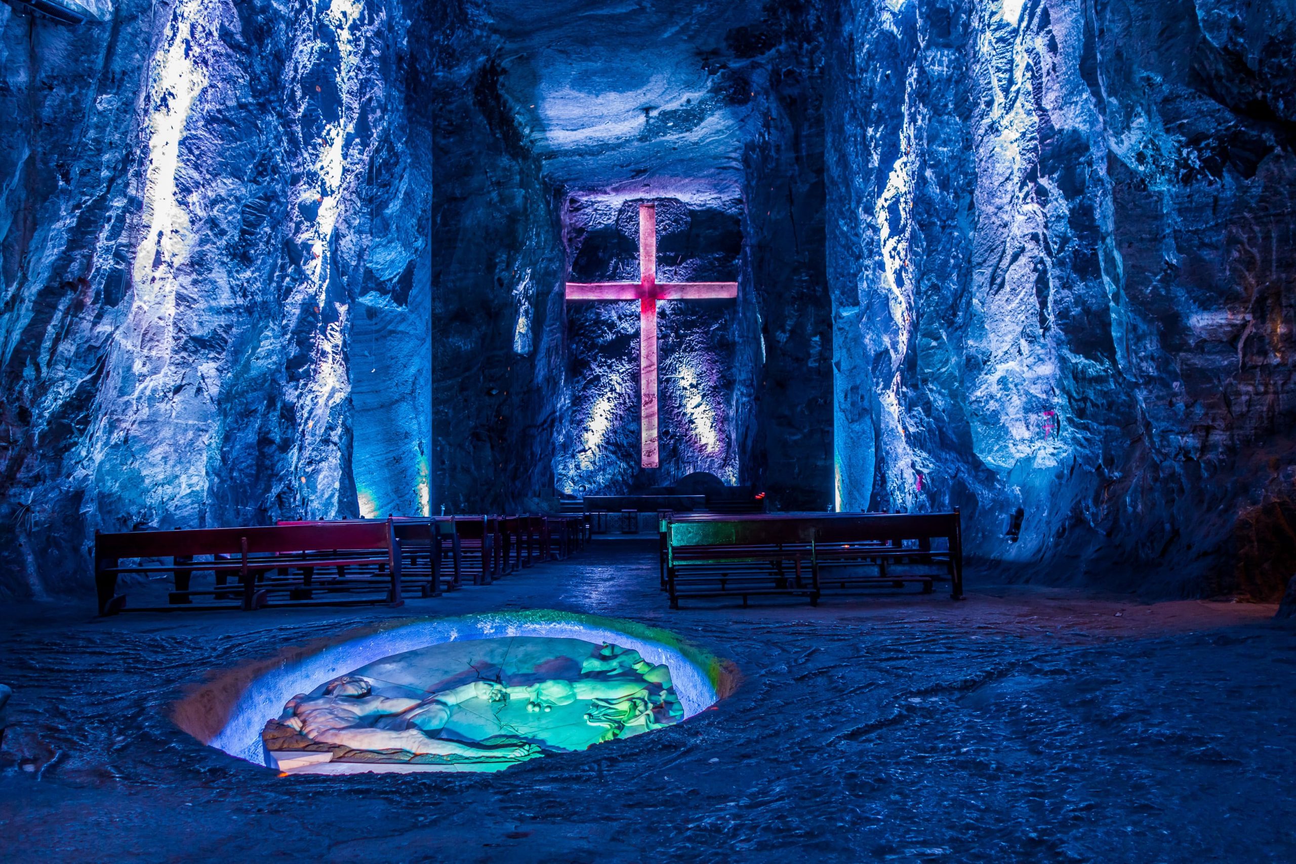 inside a cave with a religious cross