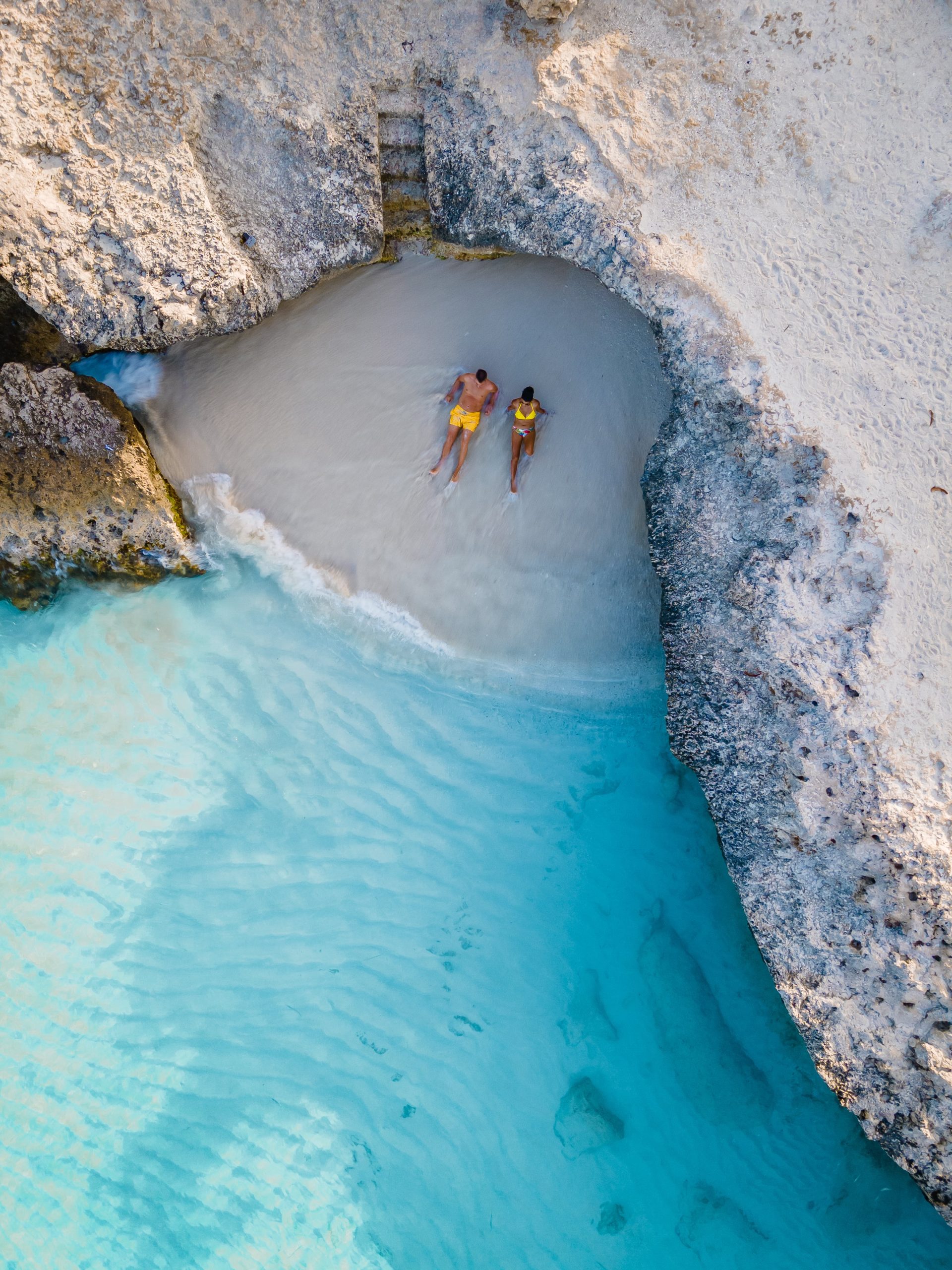 tourists at beach in aruba