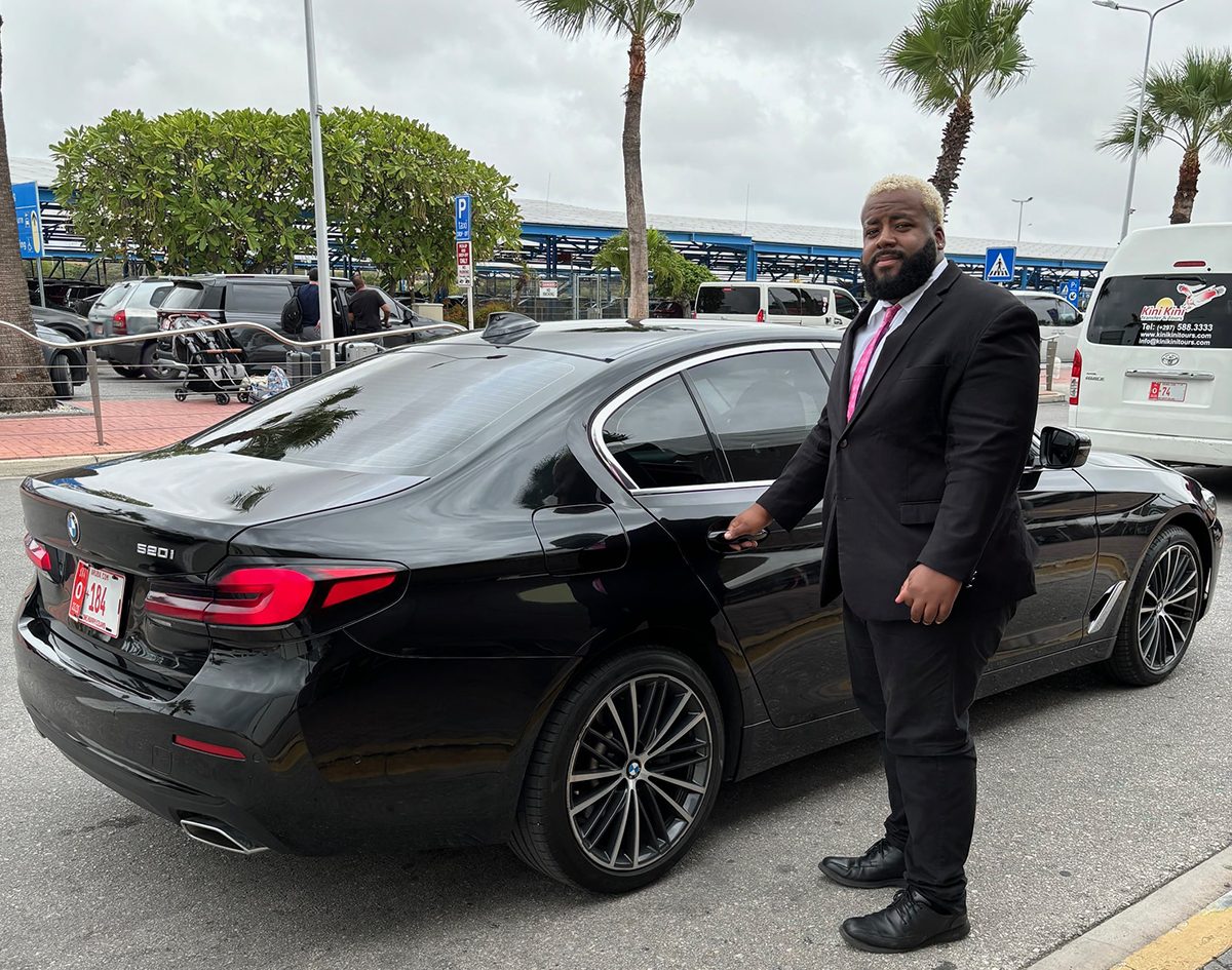 private driver with luxury sedan in aruba